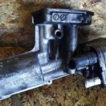 SUPORTE / COPO DO FILTRO DE OLEO COM RADIADOR AUDI VOLKSWAGEN 2.0TDI 038115389